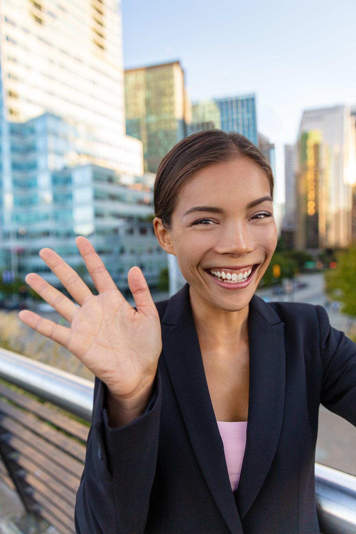 Businesswoman Waving Outdoor